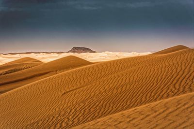 Scenic view of desert against sky