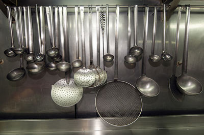 Close-up of kitchen utensils on table