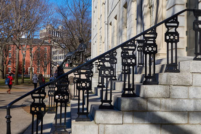 Man and woman on staircase in city