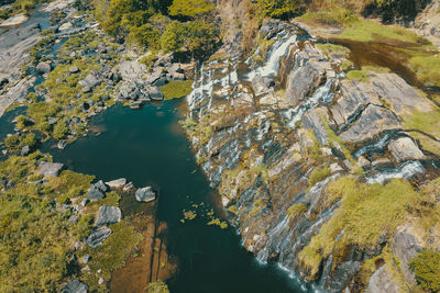 High angle view of rocks in river