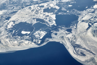 Aerial view of snow covered landscape