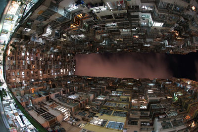 Aerial view of illuminated buildings at night