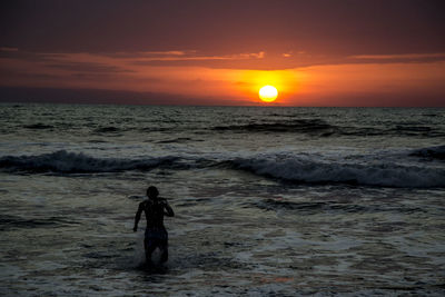 Scenic view of sea against sky during sunset