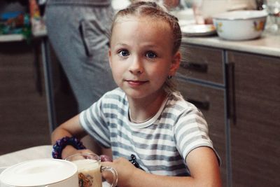 Portrait of cute girl at home