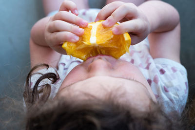 Close-up of hand holding fruit