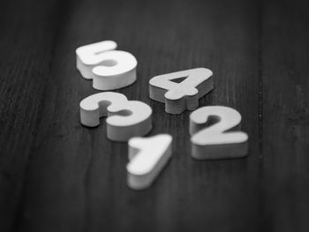 High angle view of number alphabets on table