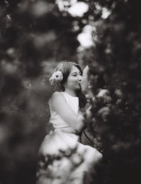 Groom kissing smiling bride