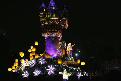 Illuminated christmas tree at night