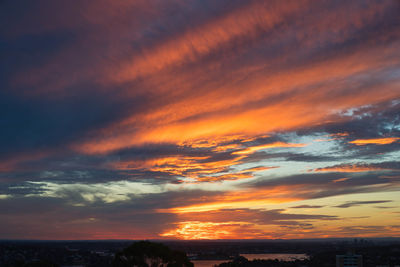 Low angle view of dramatic sky during sunset