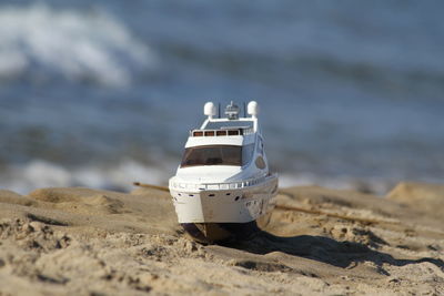 Close-up of boat on beach