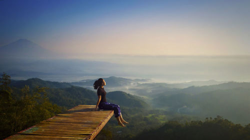 Full length of man on mountain against sky