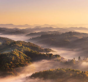 Scenic view of mountains against sky at morning