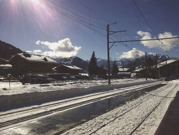 Panoramic view of railroad tracks against sky during winter