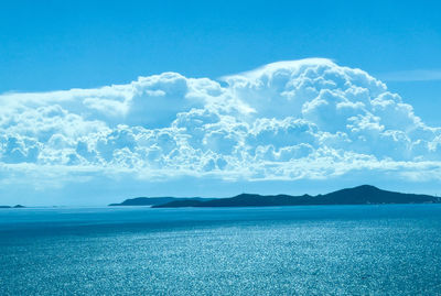 Scenic view of sea against blue sky