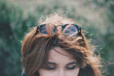 Portrait of young woman wearing sunglasses