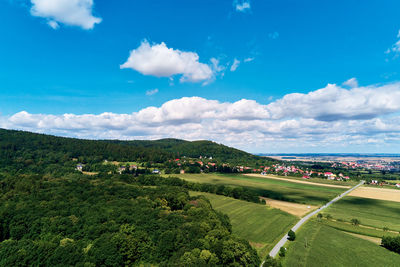 High angle view of trees and buildings against sky