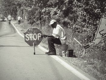 People on road in city