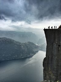 Scenic view of mountains against cloudy sky