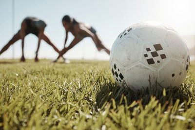 Close-up of soccer ball on field