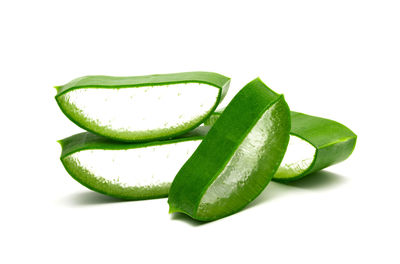 Close-up of green leaf against white background