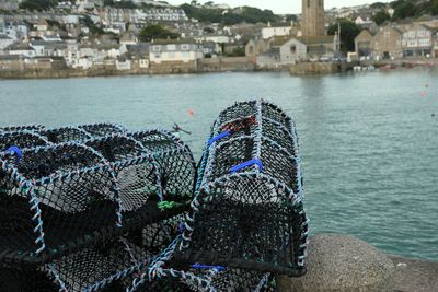 Close-up of fishing net at harbor