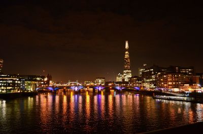 Illuminated buildings at waterfront