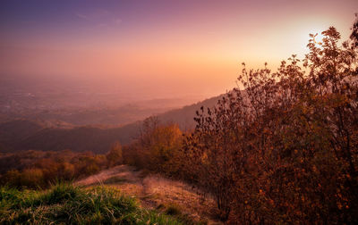 Scenic view of landscape against sky during sunset on asolo hills