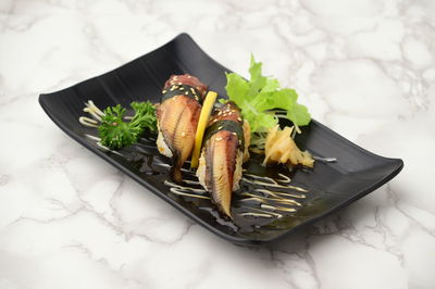 High angle view of vegetables on barbecue grill