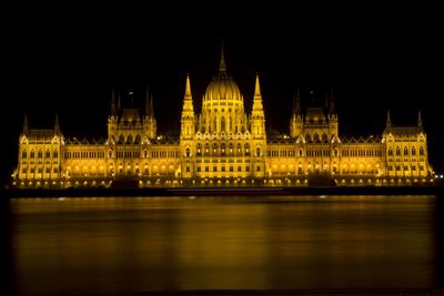 Illuminated parliament building at night