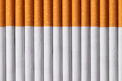 Full frame shot of multi colored pencils in row