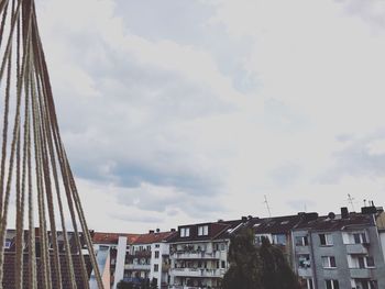 Low angle view of houses against sky