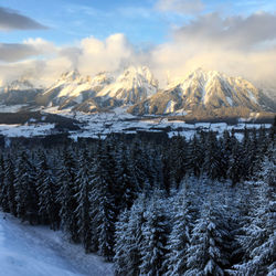 Scenic view of snowcapped mountains against sky