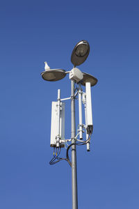 Low angle view of street light against clear sky