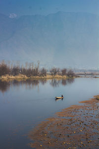 Scenic view of lake against mountain