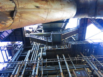 Low angle view of machinery at landschaftspark duisburg-nord