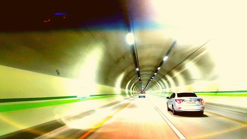 Blurred motion of illuminated tunnel