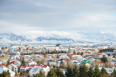 Aerial view of townscape against sky