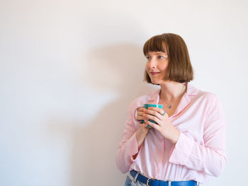 Young woman looking at camera