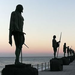 Silhouette of man standing on beach