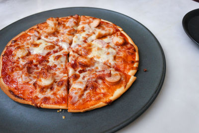 High angle view of pizza in plate