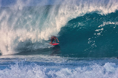 Rear view of person in sea