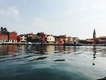 View of houses by lake