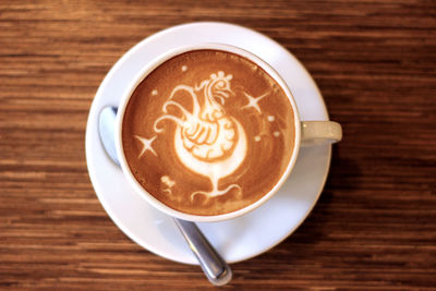 High angle view of cappuccino on table