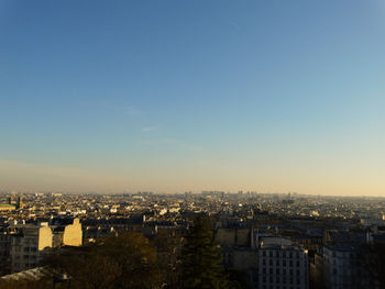 High angle view of buildings against sky in city