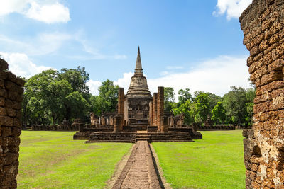 View of temple against building