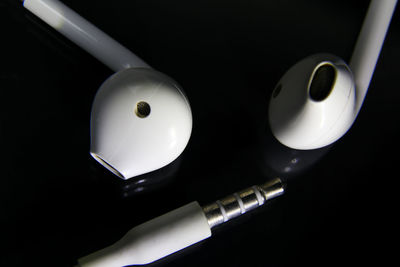 High angle view of electric lamp against black background