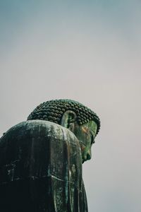 Close-up of a statue against clear sky