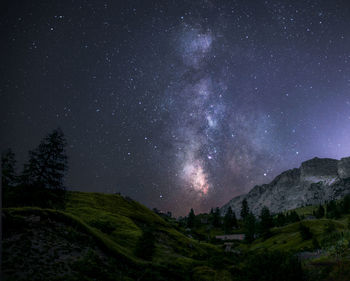 Scenic view of star field against sky at night