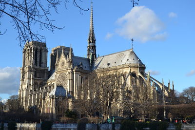 Low angle view of church against blue sky