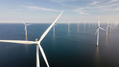 Low angle view of wind turbine